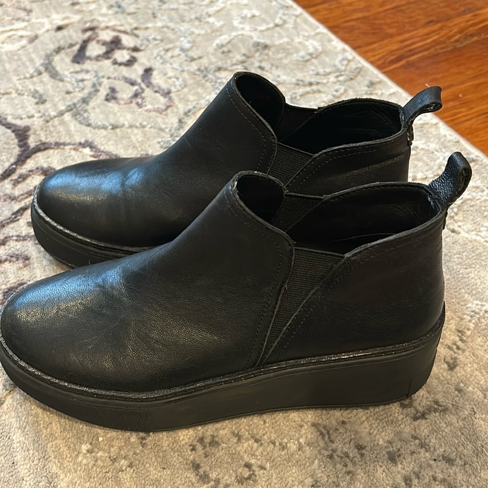 J/Slides black leather shoes
